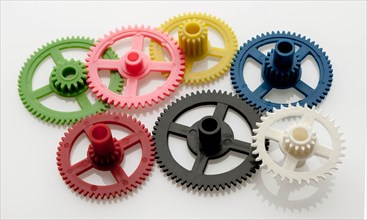 Coloured gears connected together