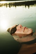 Man with swimming goggles