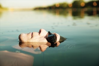 Man with swimming goggles