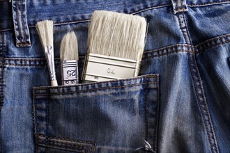Brushes in a pocket jeans