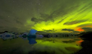 Blue iceberg in Aurora Borealis