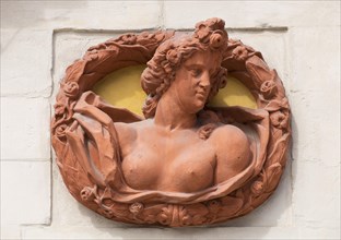 Relief medallion on the external facade of the old palace