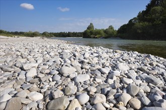 Pebble riverbank by the river Isar