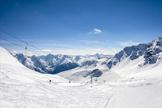 Panoramic view into the Swiss Alps ski resort Motta Naluns