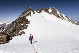 Climber on the descent from the Wildspitze at Mitterkarjoch