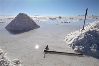 Traditional salt mining with pick and shovel