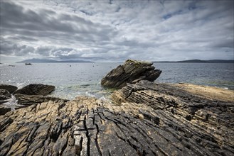 Weathered volcanic rock in the bay of Elgol