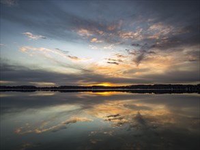 Jetty at sunrise on Worthsee Lake in Inning