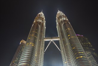 Illuminated Petronas Tower at night