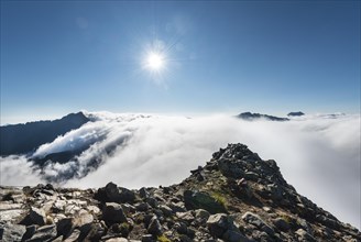 Clouds passing over the mountain ridge