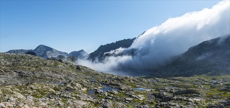 Clouds passing over Bergkam with small mountain lakes