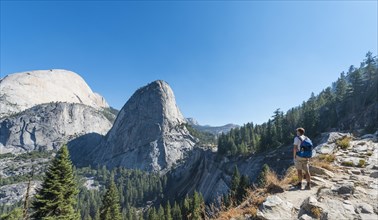 Walker looking on Liberty Cap