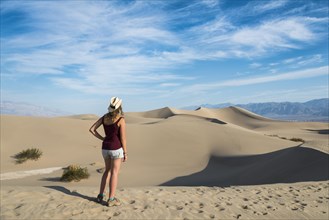 Female tourist overlooking the Mesquite Flat Sand Dunes