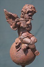 Little angel figurine with flute