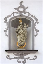 Sculpture of the Virgin Mary holding infant Jesus