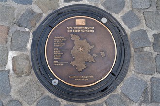 Manhole covers as a GPS reference point on the Hauptmarkt square