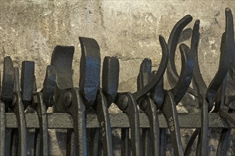 Forge tongs in a forge of the 19th century