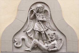 Relief of Saint George fighting the dragon on a town house