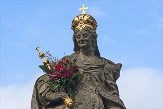 Statue of Empress Kunigunde with a bunch of roses