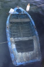Sunken fishing boat in the harbor of Finiki