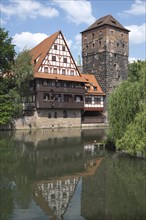 Old timbered houses and hanging tower