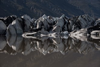 Glacier tongue reflected in the water