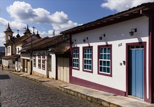 Cobblestone streets and colonial houses