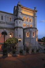 Neo-Romanesque Notre-Dame-Immaculee at dusk