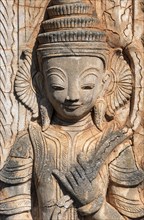 Deva statue at the ruined Nyaung Oak monastery in Inthein