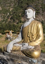 Buddha statue in Lumbini Garden under Mt Zwegabin