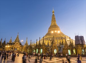 Crowds of visitors at Shwedagon Pagoda at dawn