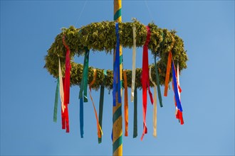 Maypole with colorful ribbons