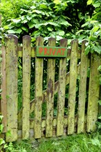 Garden gate with a sign privat