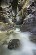 Tauglbach river flows through the Taugler Strubklamm