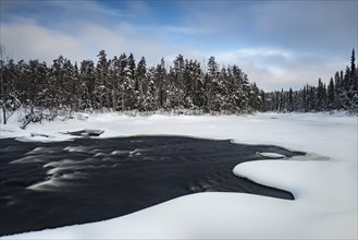 Winter landscape by Oulankajoki river