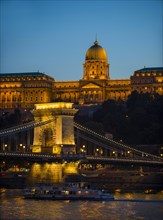 Buda Castle and old chain bridge at dusk