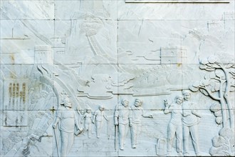 Marble relief depicting people