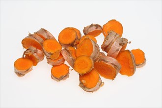 Sliced turmeric root (Curcuma domestica)