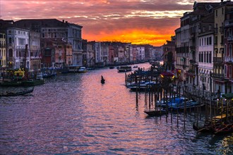 Houses and gondolas on Grand Canal at sunset