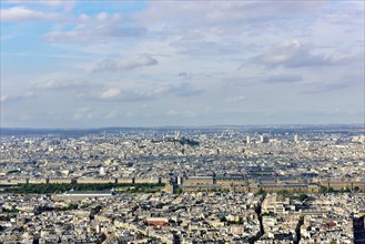 Cimentiere de Montparnasse and city centre with Louvre and Montmartre