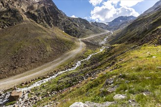 Hiking path along a glacial stream