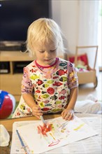 Toddler painting with watercolours