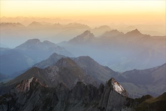 Evening mood at the blue hour on the Santis with a view of the Alps of Eastern Switzerland
