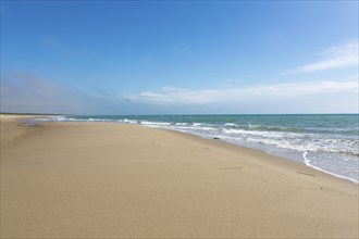 Empty sandy beach in Taranto