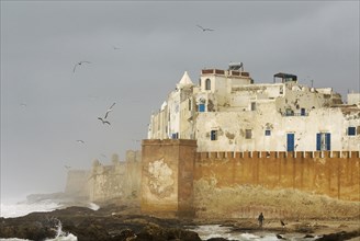 View of the ramparts of the port city of Essaouira at the Atlantic Ocean