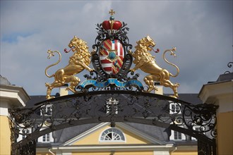 Family crest above the portal