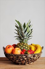 Fruit basket with a pineapple