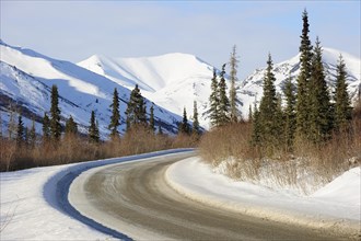 The Dalton Highway crosses the Brooks Range in the Arctic winter