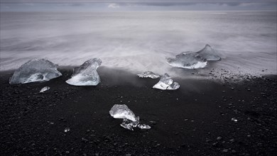 Melted icebergs on the beach of Jokulsarlon