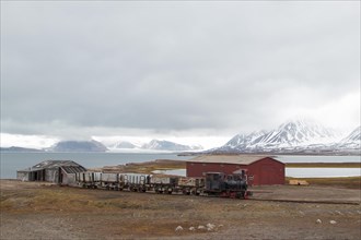 Historic mine train in front of Kongsfjorden